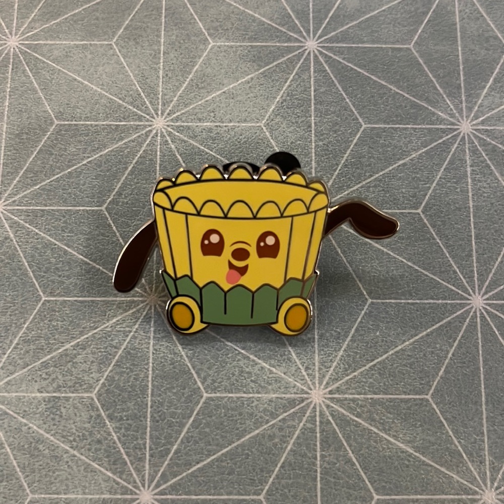 Disney munchling pin